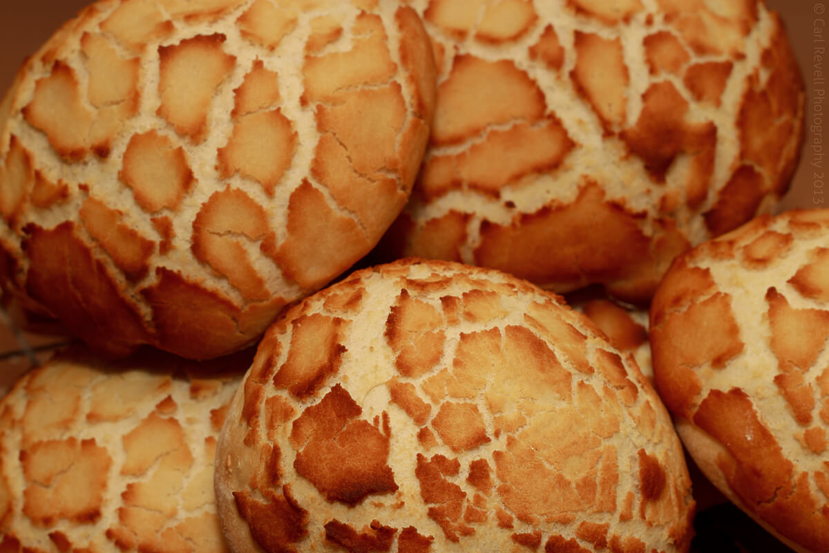 Crusty rolls with speckled top.