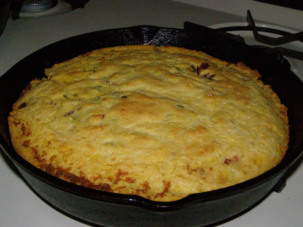 Yellow bread in a frying pan/skillet. 